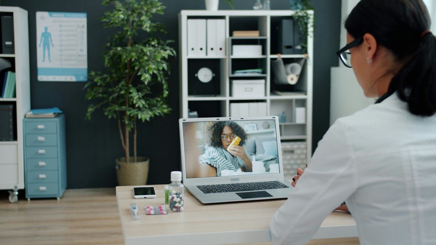 Dr. Calloway on a video visit with a member